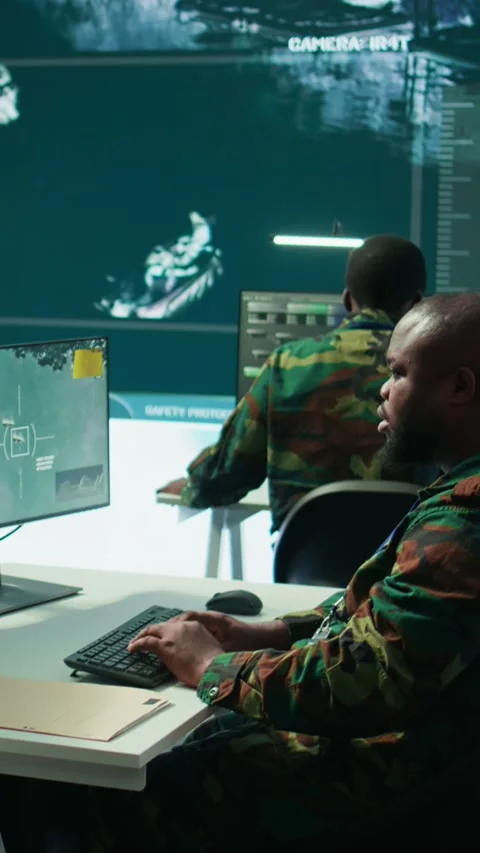 Vertical Video Army intelligence specialists using advanced computer systems and Stock Footage 280087209