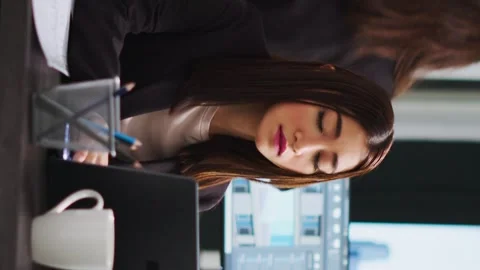 Vertical Video Asian engineer constructing residential plans using cad program Stock Footage 263082170