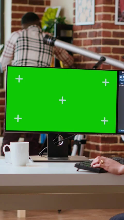 Vertical Video Asian freelancer developer working with headphones and chroma key Stock Footage 319471465