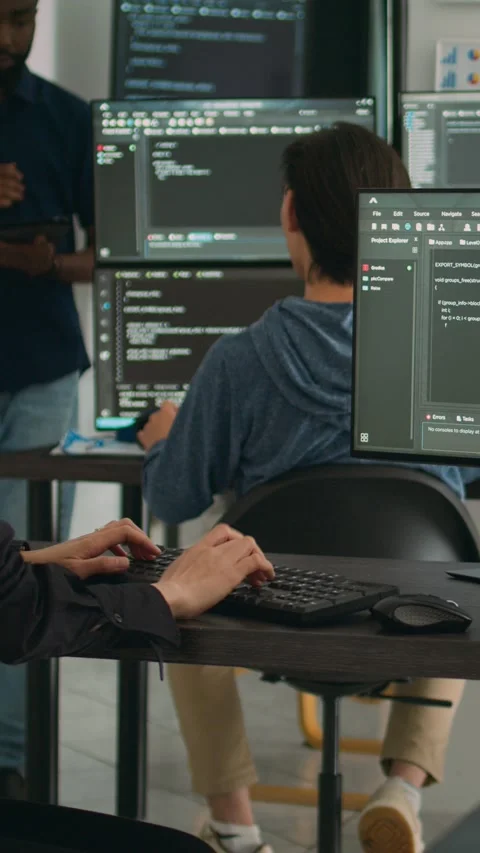 Vertical video: Asian software engineer working with user interface on computer Stock Footage 218575898