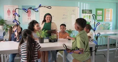Vertical video: Asking teacher in green top holding tablet at lab, kids studying Stock Footage 330499501