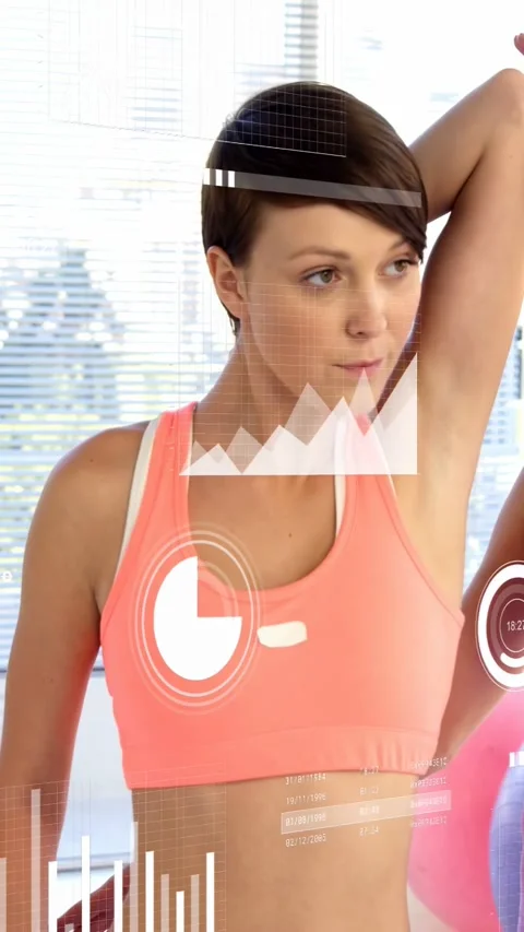 Vertical video: Assistant lifting arm, woman holding posture while patch and HUD Stock Footage 328398520