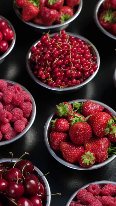 Vertical Video Assorted Berries In Bowls On Dark Background 스톡 동영상 344051526