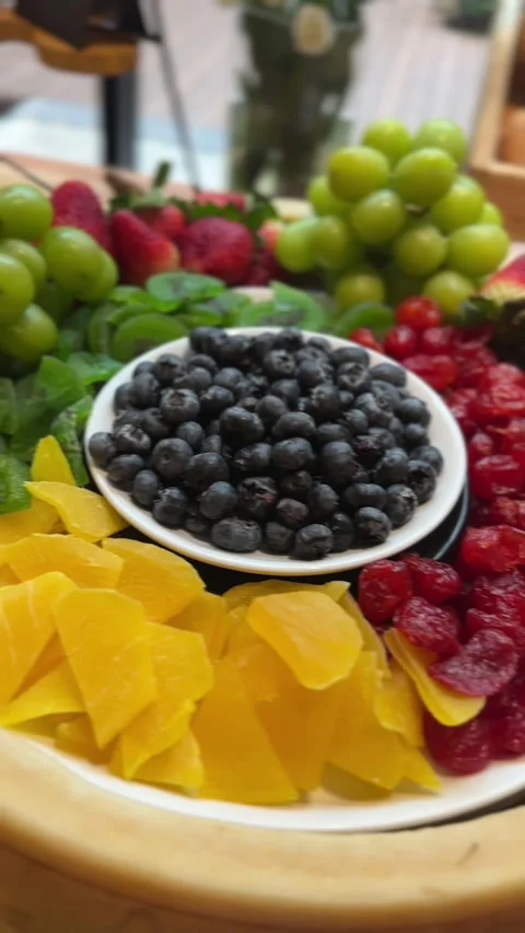 Vertical video of assorted fresh and dried fruits Stock Footage 318711903