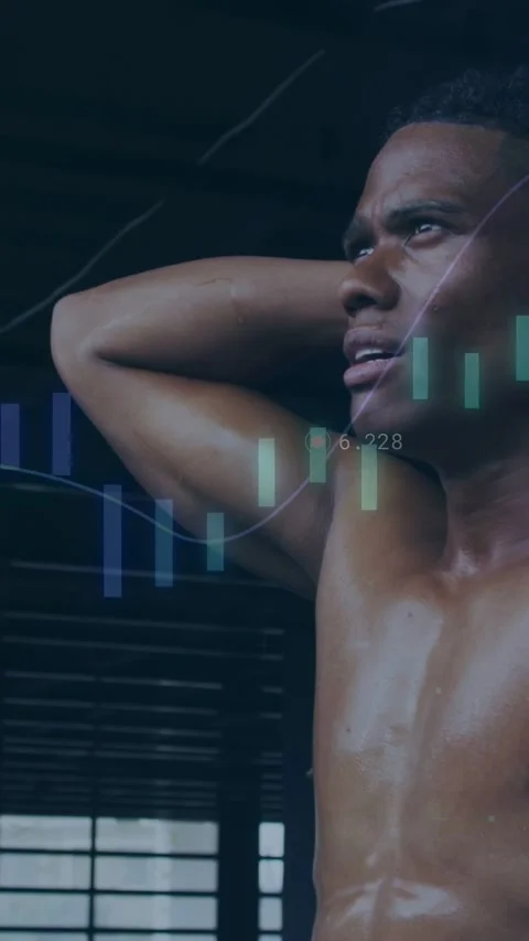 Vertical video: Athlete after set pausing, wiping sweat, resting in gym as Stock Footage 333303626