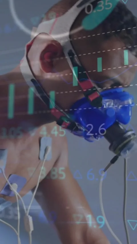 Vertical video: Athlete getting ECG leads and mask fitting, breathing while Stock Footage 330604900