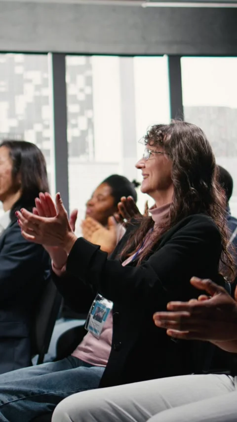 Vertical Video Audience clapping hands and applauding during speech Stock Footage 327880495