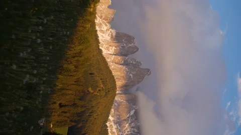 Vertical video background of beautiful mountain range and sky during sunset. Stock Footage 156941745