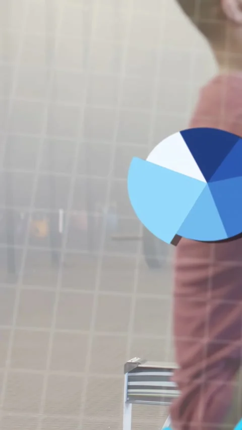 Vertical video: Bald man and partner rowing in gym, sensors sending data Stock Footage 332644927