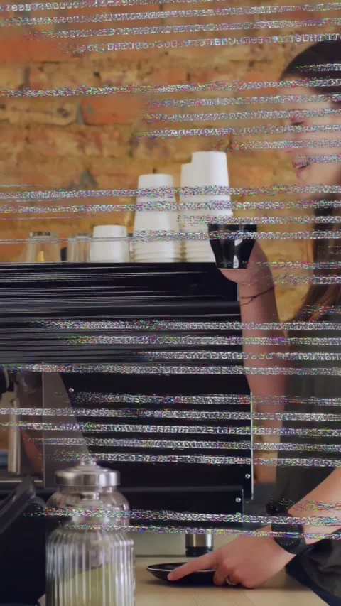 Vertical video: Barista placing cup, tapping panel for cafe order while code 库存影片 333020908