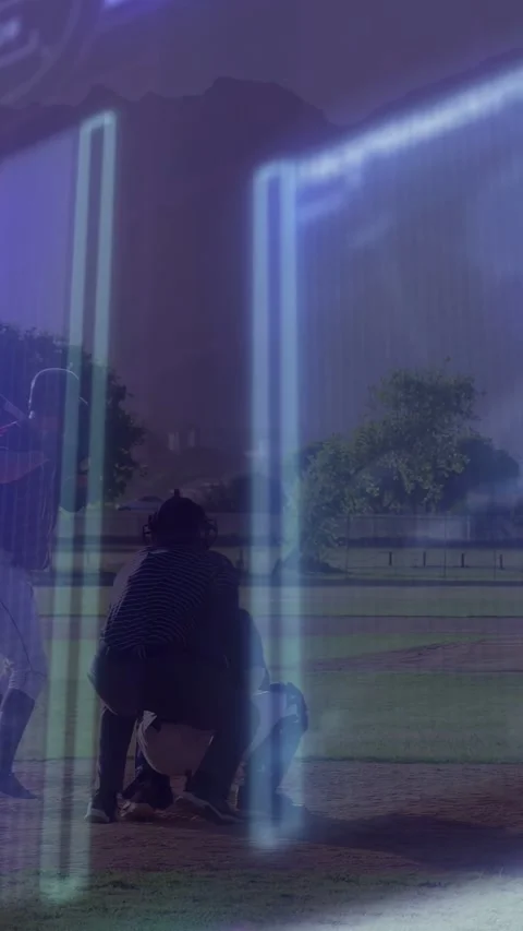 Vertical video: Baseball catcher rising as pitch prompts batter swinging bat to Stock Footage 333236194