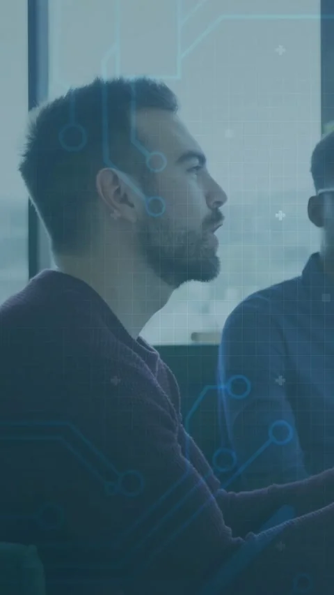 Vertical video: Bearded man raising cup, explaining software, code overlays Stock Footage 333487210