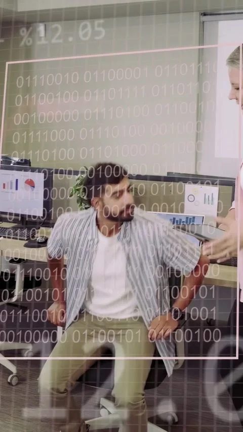 Vertical video: Bearded man turning as team showing tablet docs, comparing Stock Footage 334024836