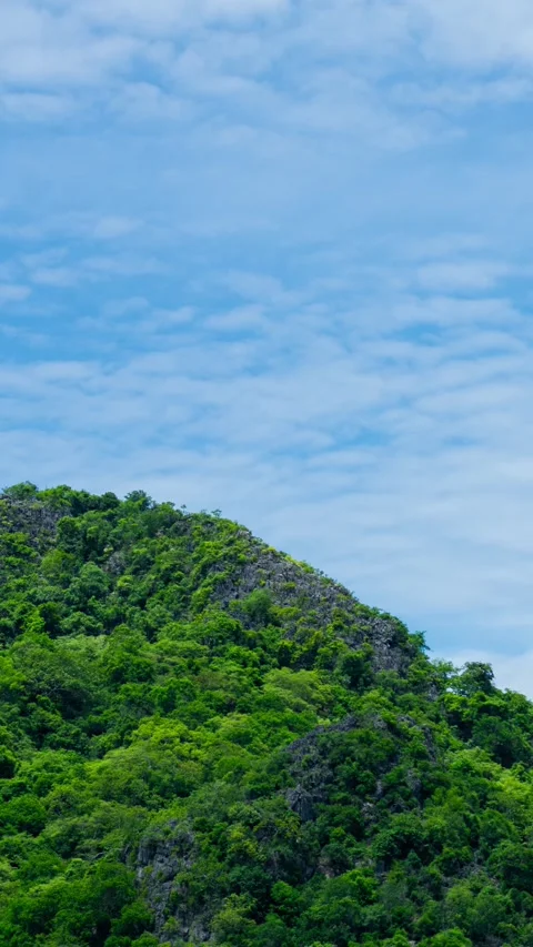 Vertical video, Beautiful panoramic view of mountains with clouds moving Stock Footage 314687986