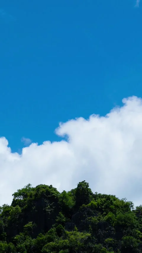 Vertical video, Beautiful panoramic view of mountains with clouds moving Stock Footage 314687992