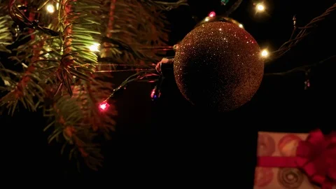 Vertical video. Beautiful presents under the Christmas tree. New Year interior. Stock Footage 115975017