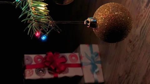 Vertical video. Beautiful presents under the Christmas tree. New Year interior. Stock Footage 115975068