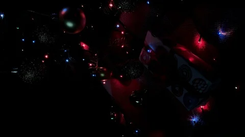 Vertical video. Beautiful presents under the Christmas tree. New Year interior.  Video stock 116753147