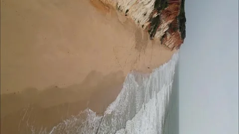 Vertical video: Beautiful rock formations on the coast of the Atlantic Ocean. Stock Footage 264028384