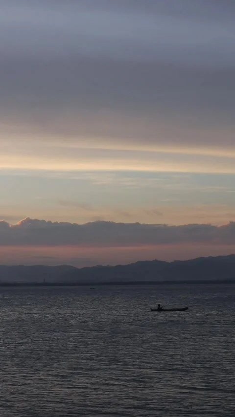 Vertical video of a Beautiful view of the sunset on a summer day. lake sunset Stock Footage 260365205