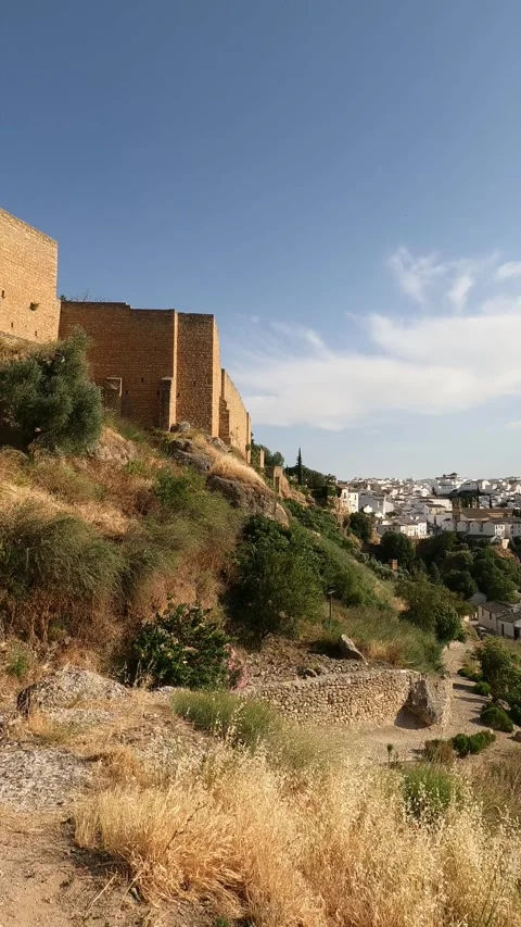 Vertical video of the beautiful white town of Ronda and medieval wall Stock Footage 344577789