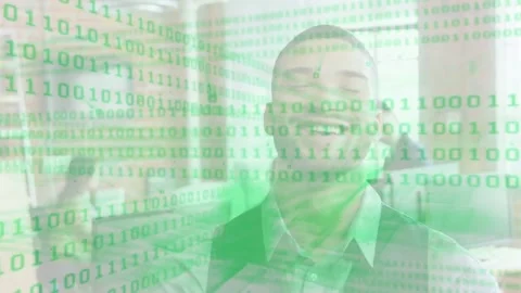 Vertical video: Binary overlay scrolling in office, man smiling, laughing, Stock Footage 334115661