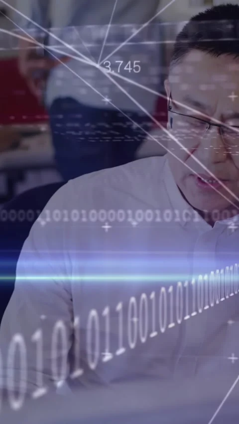 Vertical video: Binary overlay sweeping over man from start while man typing, Stock Footage 332334799