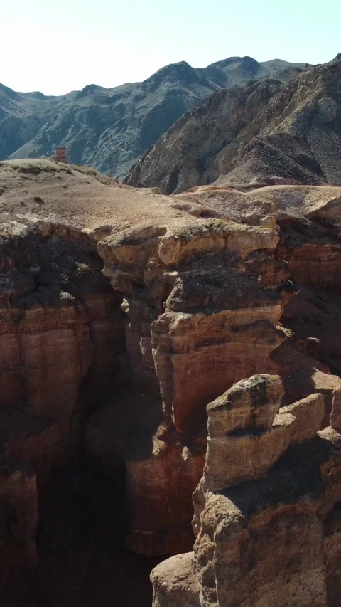 Vertical video: Bizarre red sandstone gorges, Martian Charyn Canyon, Kazakhstan Stock Footage 336691919