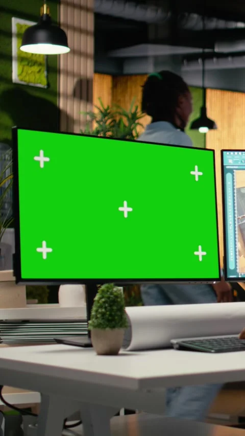 Vertical Video Black engineer works on floor plan design with a mockup display Stock Footage 316340620