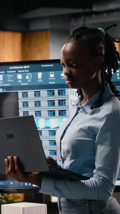 Vertical Video Black female developer reviewing zoning regulations with 3D Stock Footage 316339255