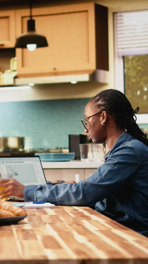 Vertical Video Black IT engineer working remotely coding on laptop and Stock Footage 344529562