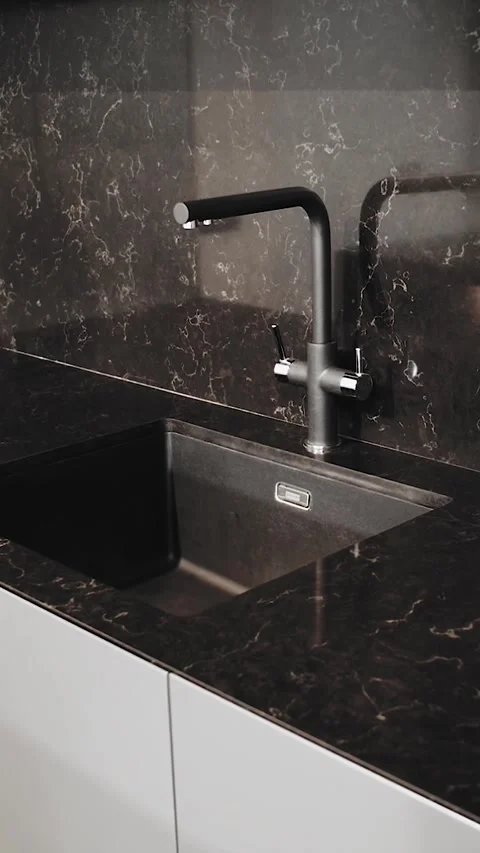 Vertical video. Black kitchen sink and faucet. Modern kitchen interior with Stock Footage 323451257