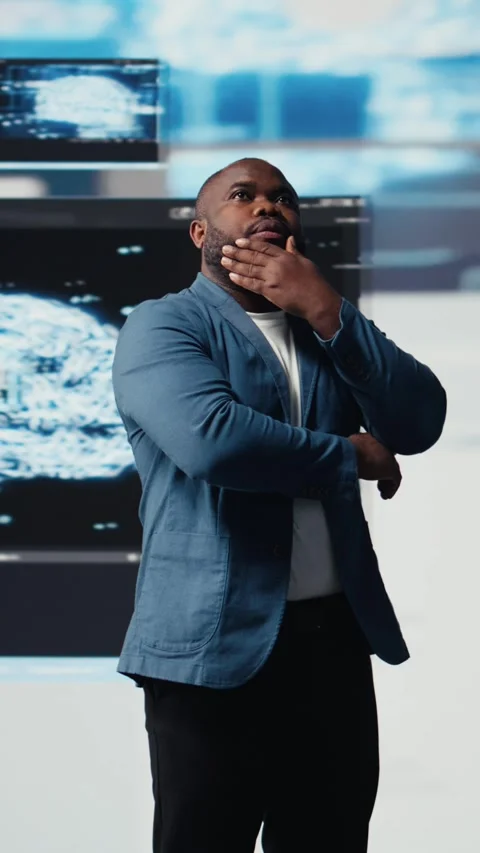 Vertical Video Black software developer immersed in code development Stock Footage 312123737