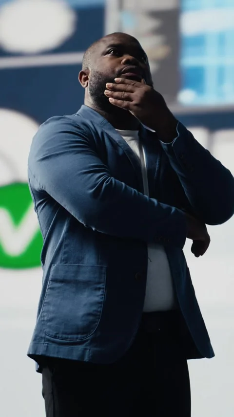 Vertical Video Black software developer immersed in code development Stock Footage 312123987