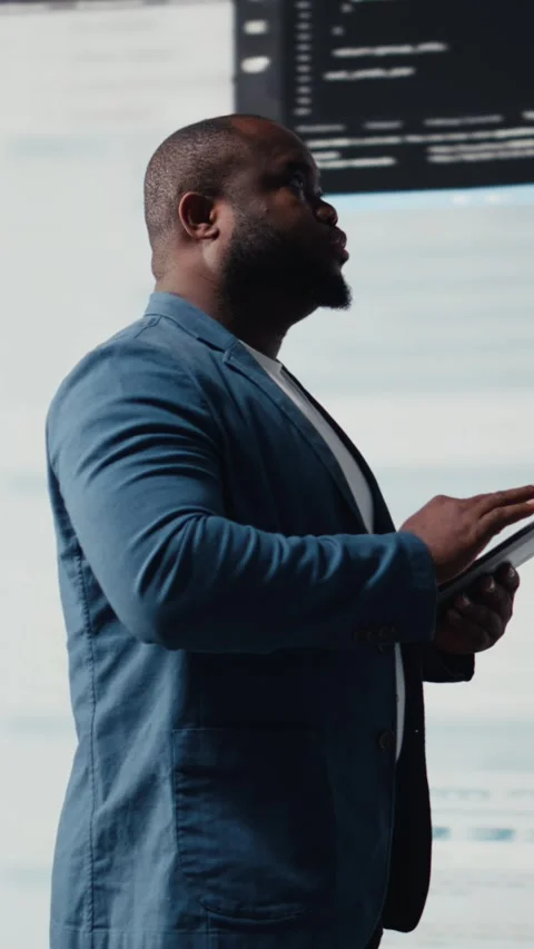 Vertical Video Black software expert focusing on programming language for Stock Footage 312123729