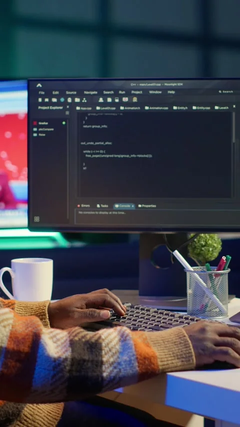 Vertical Video Black web developer handling database servers for safety with Video stock 319543100