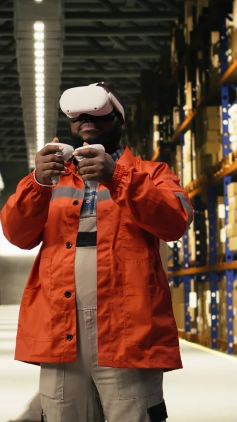 Vertical Video Black worker practices parcel scanning in VR environment with Video stock 333089930