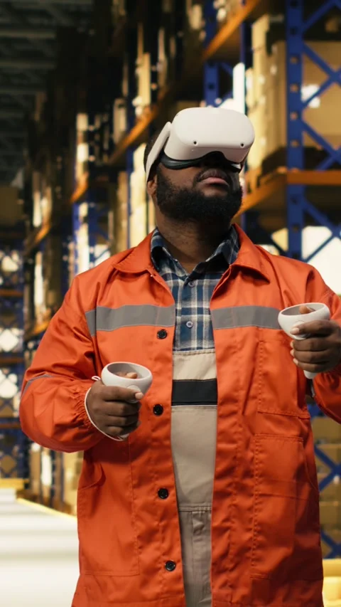 Vertical Video Black worker practices parcel scanning in VR environment with Video stock 333091376