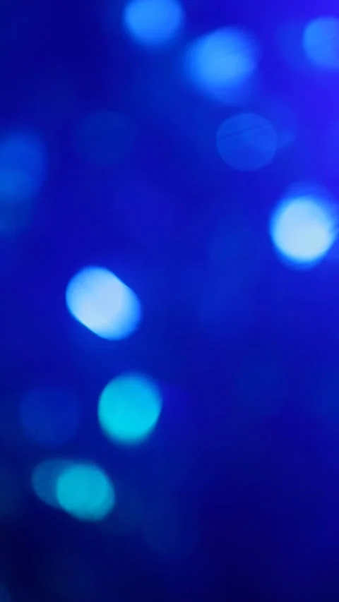 Vertical video of blue bokeh background Stock Footage 247832529