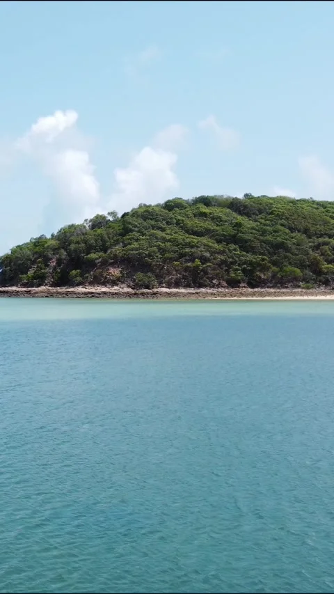 Vertical Video of blue tranquil sea with waves and skyline Stock Footage 276583013