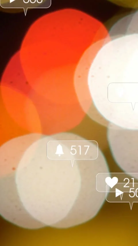 Vertical video: Bokeh shifting, frames advancing, badges appearing, updating 스톡 동영상 330332885