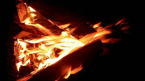 Vertical video. Bonfire close-up. Night Video stock 103257280