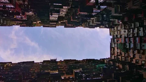 Vertical video. Bottom view of residential building and blue sky in asian city Stock-Footage 123075272