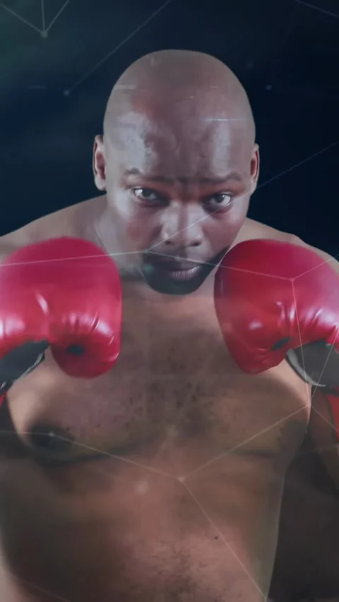 Vertical video: Boxer in guard, red gloves bobbing, jabbing, gauging range, node Video stock 331047210