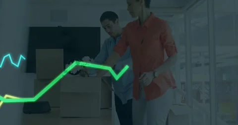 Vertical video: Boxes arriving, pair unpacking for business placing plant while Stock Footage 331046216