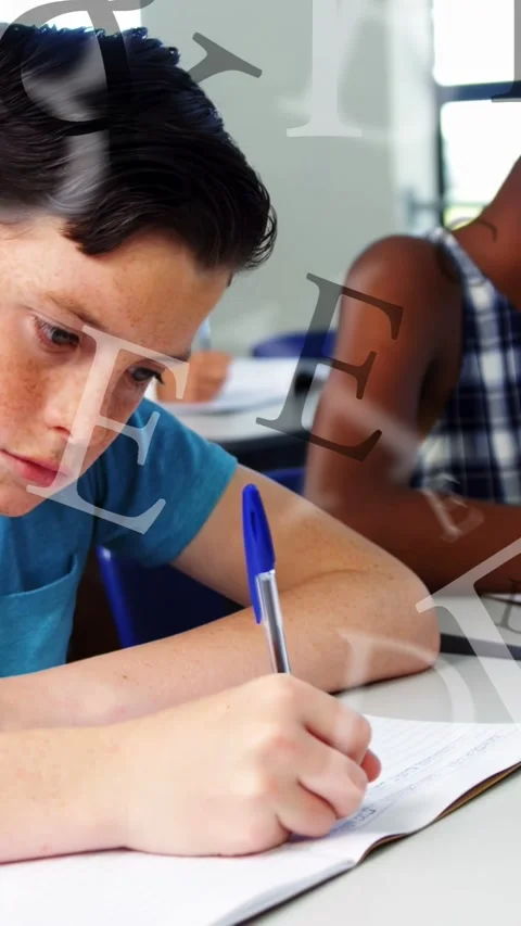 Vertical video: Boy blue pen touching page, writing class task while letters Stock Footage 335507601