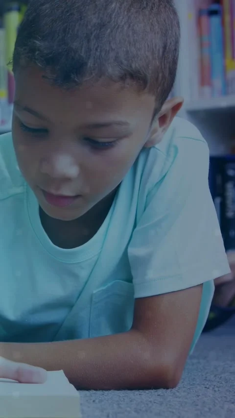 Vertical video: Boy following text with finger, growing AR binary, HUD rings Stock Footage 333745340