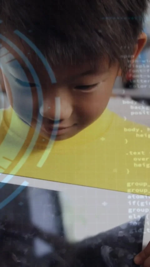 Vertical video: Boy raising head after classroom prompt, showing tablet as HUD Stock Footage 331238470