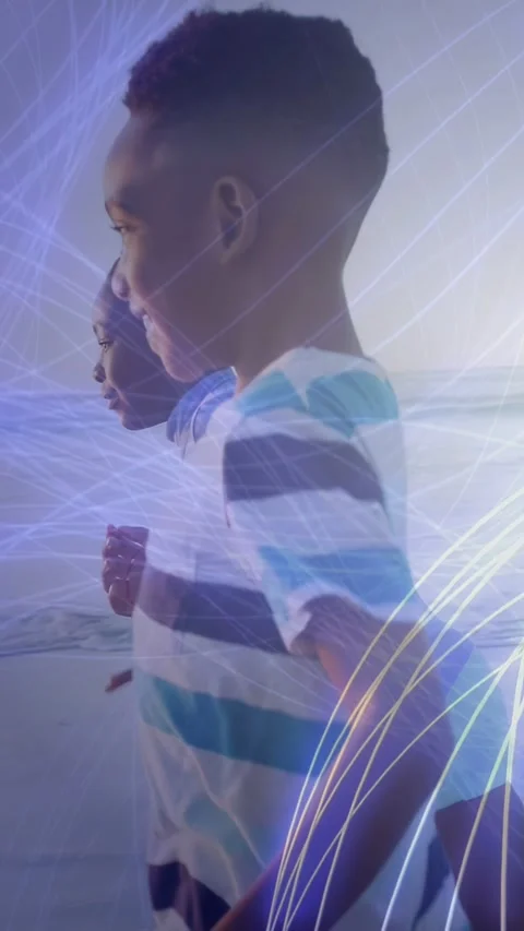 Vertical video: Boy reaching hand then running shore, girl joining as blue Stock Footage 333037033