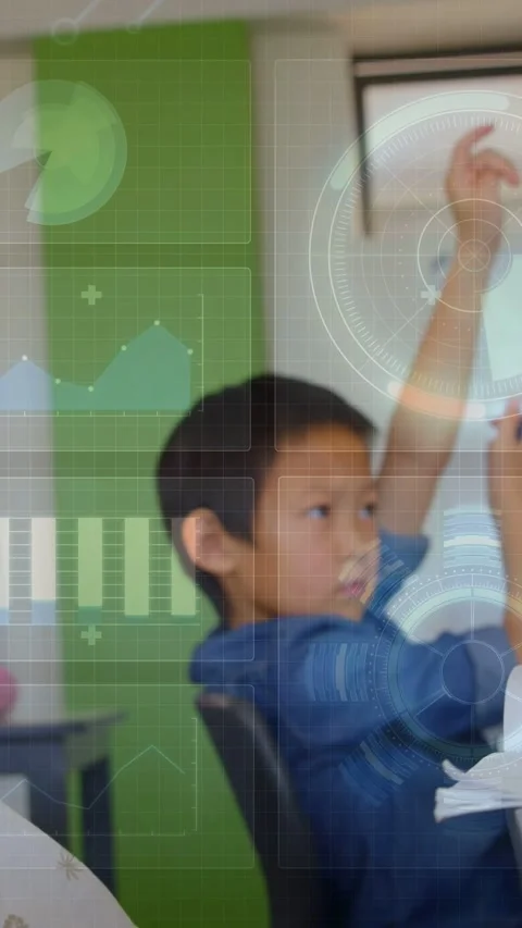 Vertical video: Boy sitting in classroom raising right arm asking help, papers, Stock Footage 333141361